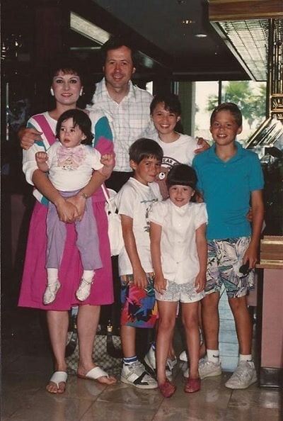 A picture of Sarah Elizabeth Osmond with his siblings and parents.